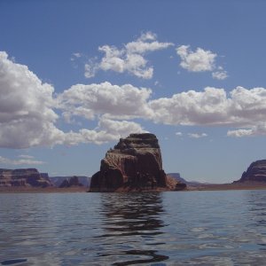 Gregory Butte, smooth water, and clouds
