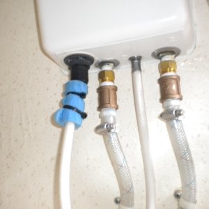 Adapters installed on Scan Vik shower.
No more leaks!