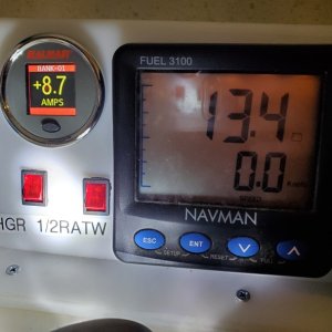 Media 'Control panel, showing the 2 control switches, 1/2 rate charging of ~8 amps and Li battery voltage' in album 'Here's what we're replacing: 2 ea golph cart batteries, 70 lbs. ea'