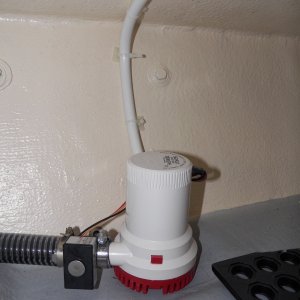 Media 'Pump switches were getting bad reviews, so I went with a new-fangled water sensing switch.  The wiring is in a plastic coated flexible aluminum conduit left over from another project.  Looks like it will work great.' in album 'I broke the screen on my original bilge pump when tearing it off to fix the balsa penetration.  I decided to upgrade because some of the newer pumps are getting good reviews a.  Plus, the through hull is now on the other side so a new improved hose was also installed.'