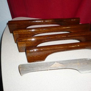 Media 'Old handhold weathered piece in foreground. 4 cuts from old roof mount salvaged and restored by sanding, adding gunstock stain and 9 coats of urethane.' in album 'New handrails urethaned to Sea Wolf standards'
