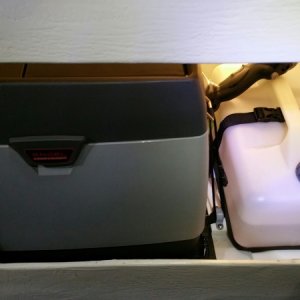 Media 'We put an Engel MD14F freezer under the helm seat in the storage compartment. So far, we are storing rain gear and some larger kitchen goods behind it and access is good enough for those items.' in album 'We put an Engel MD14F freezer under the helm seat in the storage compartment. So far, we are storing rain gear and some larger kitchen goods behind it and access is good enough for those items.'