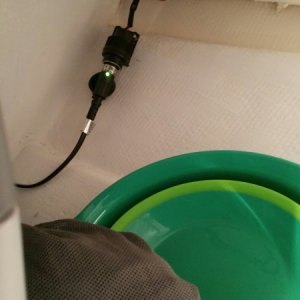 Media 'Added a power outlet in back corner of storage space for the standard 12v Engel freezer DC power cable' in album 'We put an Engel MD14F freezer under the helm seat in the storage compartment. So far, we are storing rain gear and some larger kitchen goods behind it and access is good enough for those items.'