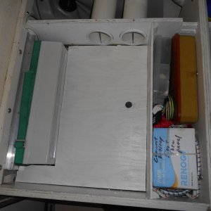 Media 'Seat cushion removed to show barrier between lower, air return plenum, and upper, cold air out plenum.' in album 'It was either add air conditioning or not sleep on the boat all summer.  Here the unit is stored when not in use.'