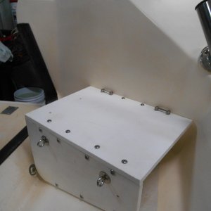 Made with thick starboard and aluminum angle, it's bolted together.