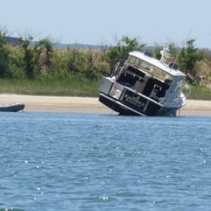 let the tide run out so he could clean the boat's bottom