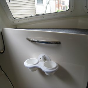 Hand hold from West Marine. Absolutely needed and shoulda come stock. SeaSucker cupholders are great!