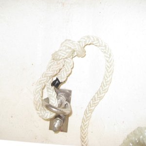 Anchor line ring threaded onto bow eye bolt. This should be stock.