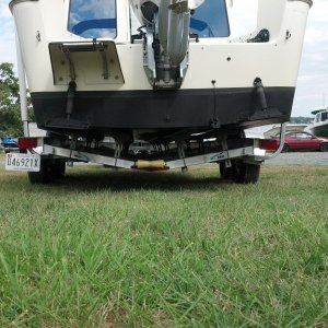 Off center loading even with dock hand help. Solved with custom side rails.