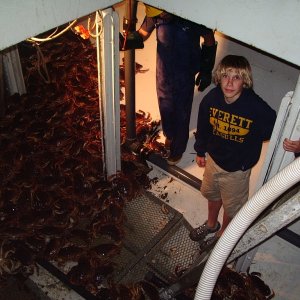 Nick helping Uncle Jeff unload crab.