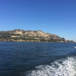 If I had a telephoto lens, you could see a group of boats fishing...