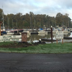 Locals might know it as the Cathlamet marina, but this sign is also how it\'s named on the charts! Our boats in the background.
