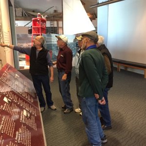 Jerry showing the group around in the  museum