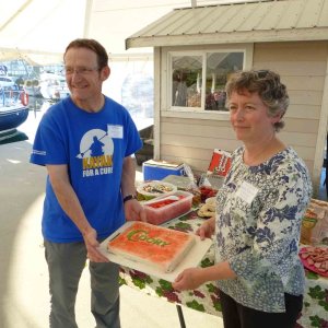 Media 'Michael and Monica, our hosts with a C-Dory cake' in album 'Boat just arrived at Port Boat House'