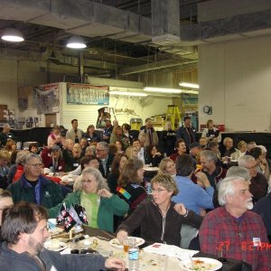 Large crowd enjoying the factory party