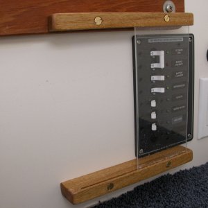 AC Power Panel cover_'b' view.  Plexiglass height was chosen for:  lower slide to be as high as possible to allow door under carpet to open as far as possible,  not to have slide cover any part of the power panel and  keeping the bottom circuit breaker blank space clear for a future addition.
