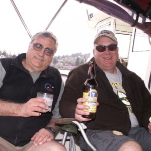 Pat Anderson and Garry Anderson - Sundowners on Cockpit of Daydream 4-4-09