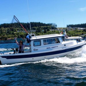 Greg & Flora on Reel Knotty & Ron & Anne on Meander from Powell River leading the tour