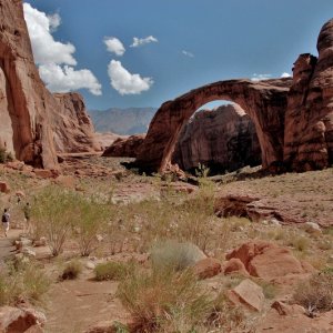 Group hiking to bridge.