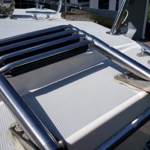 Tighten, squeeze some out, then tighten a little more.
Excess sealant is your best friend in the fight against crevice corrosion.