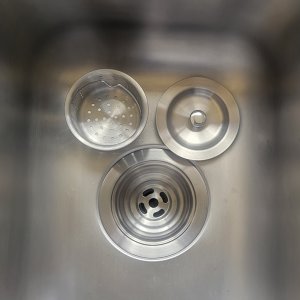 New deep drain with removable basket and lid.