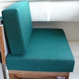 Media 'Sliding seat in new position. 

A lumbar pillow is nice to use here. We often sit on a PFD cushion for a better look-out/view. Not pictured here, I added a snap under the table and a small strap snaps into it and then snaps onto the existing cushion snap. This hold the back-rest cushion in place.' in album 'Sliding seat in new position. 

A lumbar pillow is nice to use here. We often sit on a PFD cushion for a better look-out/view. Not pictured here, I added a snap under the table and a small strap snaps into it and then snaps onto the existing cushion snap. This hold the back-rest cushion in place.'