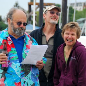 Reverend Jim  christens C-Dor? while Steve and Cindy look on