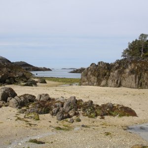 Sandy beach in Weeteeam Bay, Aristazabal Island west coast