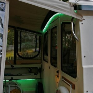 Led rope lighting installed under both port and starboard gunnels draw only .4A. Only one side is needed to illuminate the cockpit and much of the cabin. The rope over the cabin is just for fun.