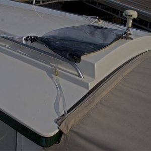 sunshower positioned with hose into cockpit for warm water shower.