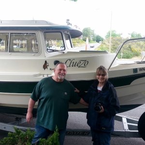 Mike & Helen with ClueZo our new boat!