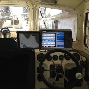 Ipad 2 located next to the Garmin 4212 on the Captains side.  Using the Ram mount with the three and a half inch suction mount really works great.