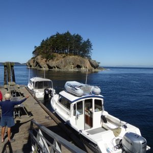 Brock describing "the one that got away" to a couple of sailors at Matia