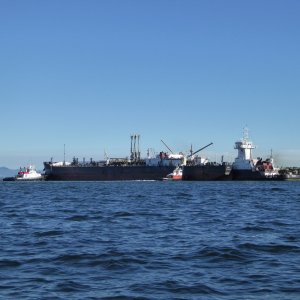 Barge being docked at the refinery