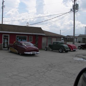 Restored Route 66 - continuous flow of hot rods, custom cruisers, antiques and motorcycles.