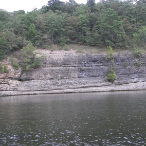 Dripping Springs, AKA "The Drip". Hundreds of boats raft up here every weekend for partying (not my scene) and the college girls play "girls gone wild", running across the rafted boats. They even have their own internet site, "igotflashed.com" , I think that's it.