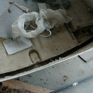 Media 'here is a shot looking straight down  after the rotten material was stripped out.(note that it was taken out all the way down into the flooring' in album 'the motor well is detached and ready for stripping the rotten wood out'