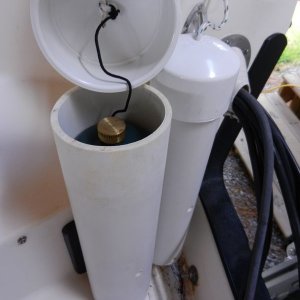 The large one fits two 1lb propane bottles