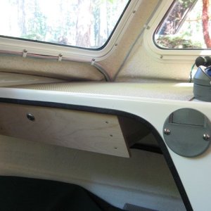 Media 'Stove mount with locking storage drawer to the left.' in album 'Anchor retainer using quick release pin to allow removal of anchor line from bow roller. Neoprene pad prevents scratches.'