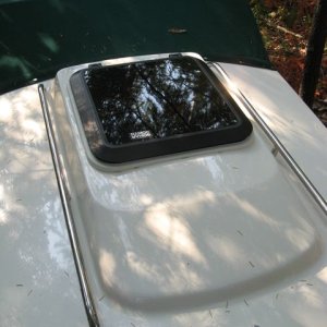 Overhead hatch added to cabin-- outside view. Bowmar 900 series 16" model. Camperback is shown behind hatch.