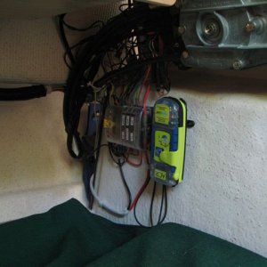 Media 'PLB mounted under helm station.' in album 'Anchor retainer using quick release pin to allow removal of anchor line from bow roller. Neoprene pad prevents scratches.'