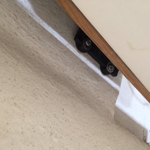 Yeah.  That's right.  Install the pump...then install the shelf to block the bottom mounting screws.  BRILLIANT!!!!