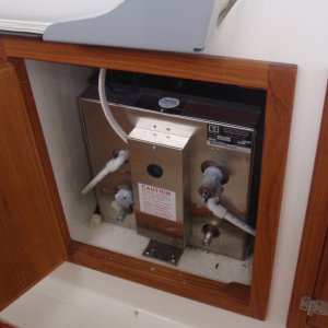 Hot water heater below helm seat
