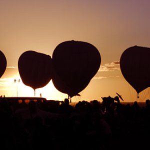 gas balloons at sunset