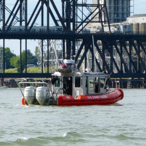 Rose Festival - Coast Guard Patrol by Navy ships