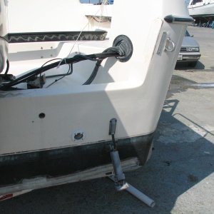 Transom, just before compounding at transom corner and final epoxy coat on bottom of transom, where Transducer starboard block will be screwed into solid glass