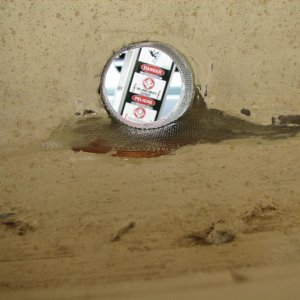 a layer of glass fibers and a layer of 10 oz cloth laid over the void with epoxy.  A second layer of cloth is placed over this and into the transom opening