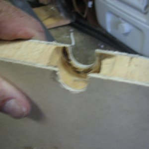 drilled a hole in deck of pearson 30 balsa core--undercut with dremel sander