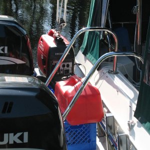 Generator and tank on engine bracket
