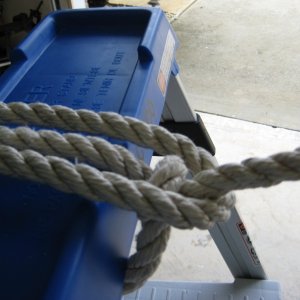bring free end around the line to the boat the opposite way